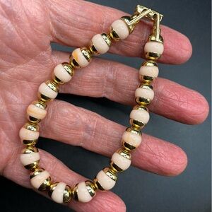 AVON Cream/Peach Goldtone Beads Bracelet With Foldover Clasp